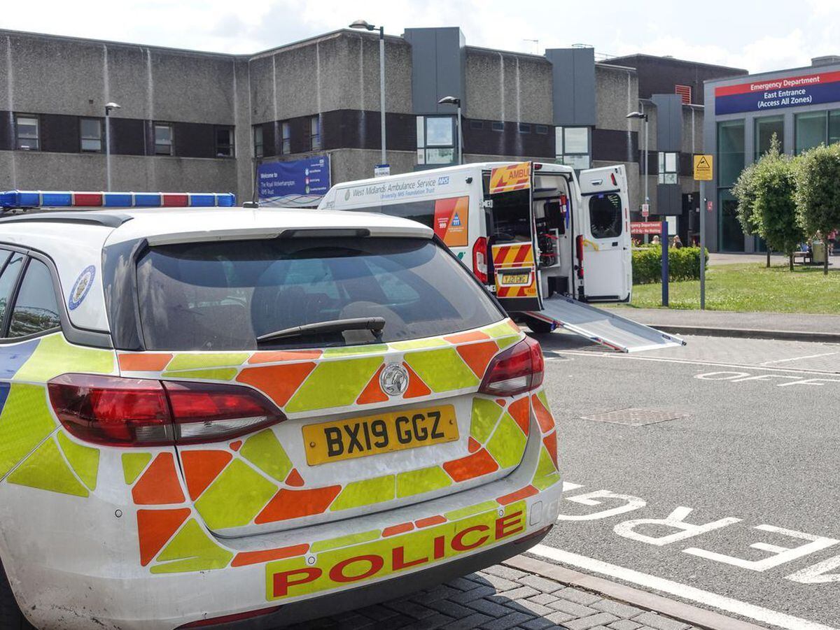 Police at the Emergency Department entrance of New Cross Hospital in Wolverhampton after a member of staff was stabbed. Photo: SnapperSK