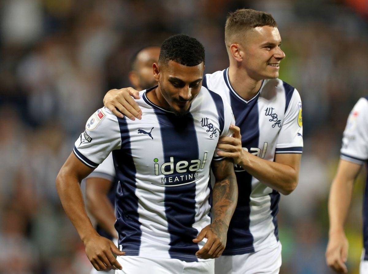 Karlan Grant of West Bromwich Albion celebrates after scoring a goal to make it 1-0 with Conor Townsend  of West Bromwich Albion during the Carabao Cup First Round match between West Bromwich Albion and Sheffield United at The Hawthorns on August 11, 2022 in West Bromwich, England. (Photo by Adam Fradgley/West Bromwich Albion FC via Getty Images).