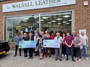 The Mayor of Walsall, Councillor Rose Martin, centre, presents the cheques