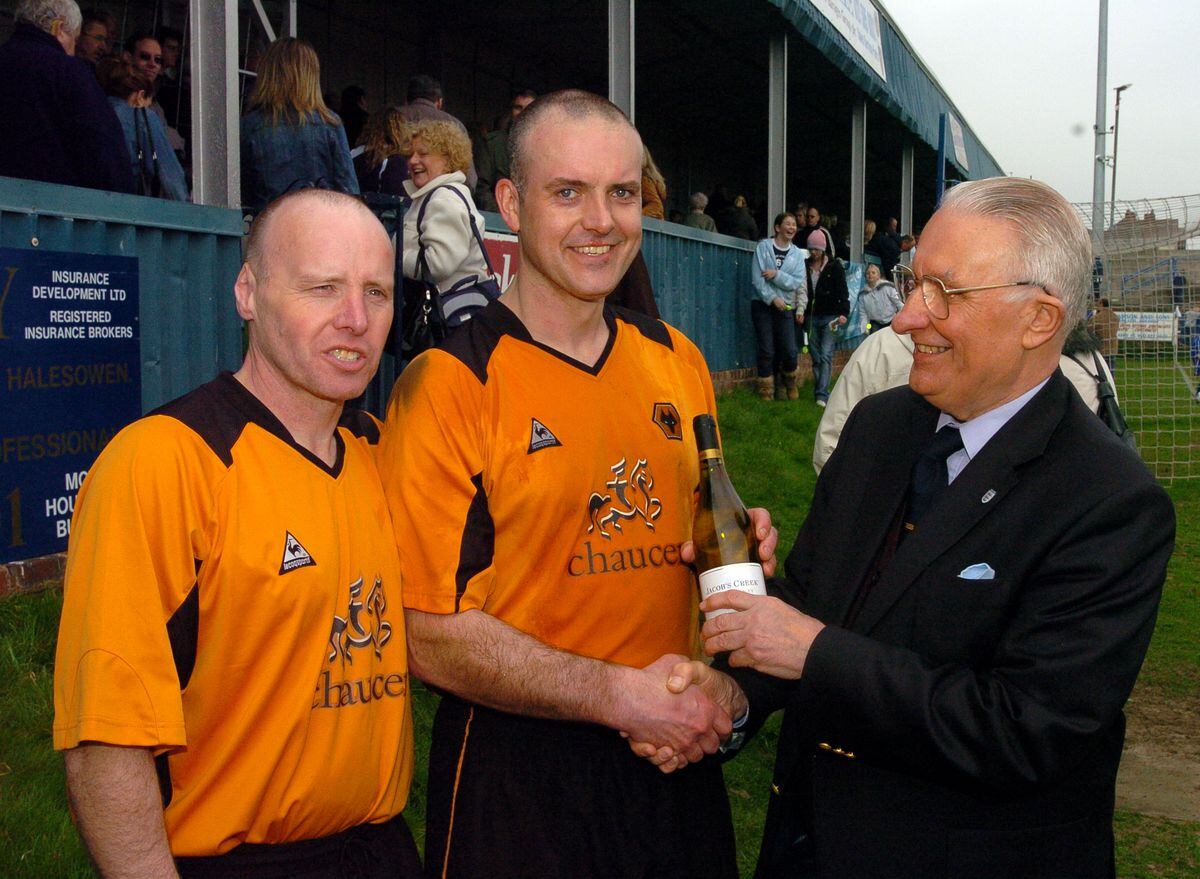 Charity football at Halesowen, Express & Star V Midland All Star XI.  Man of the match Duncan Rose (middle) with his bottle of wine presented by Peter Creed (right) and one of the organiser Roy Williams.