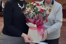 After presentation of Club Regalia, to new Chairman Chris Ballett; outgoing Chairman,  Anne Bumford, received flowers as  appreciation from members (L to R)
