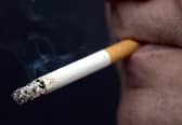 PICTURE POSED MY MODEL: A general view of a man smoking a cigarette.(Photo from Jonathan Brady/PA Images)