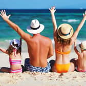 File photo of a family at the beach. Picture: Adobe stock