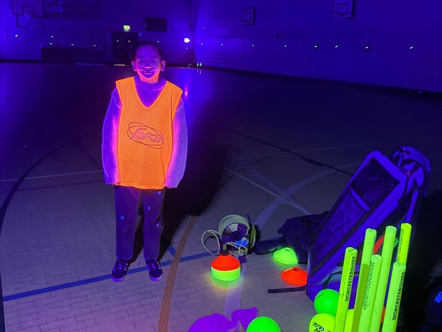 Mahnoor Qayyum with Glow cricket equipment