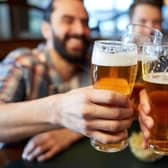 Drinking beer in a pub. Picture: Adobe Stock