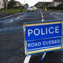 West Midlands Police officers remain at the scene