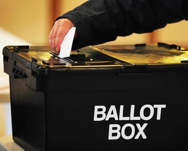 A voter placing a ballot paper in the ballot box. PIC: Rui Vieira/PA Wire