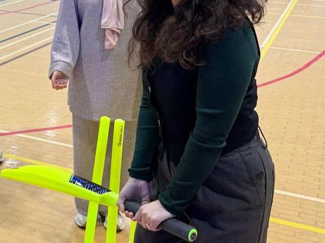 Cllr Adeela Qayyum (behind the wickets), Dr Samara Afzal (batting)