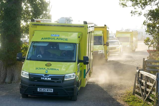 Ambulances joined the emergency response at the Christian festival, near Steyning. Photo: Eddie Mitchell