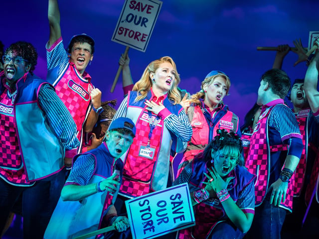 The cast on stage.